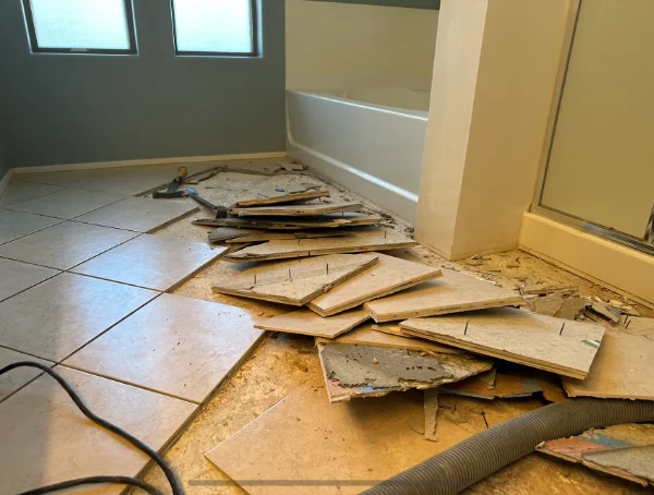 A small 2nd floor bathroom where we used our Dust Free Tile Removal saws to cut up the floor and then remove the tile and old tile backerboard.